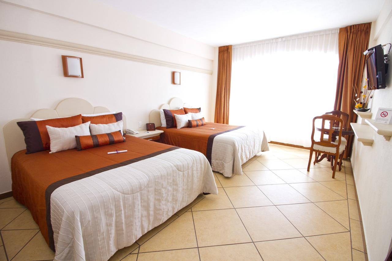 צ'יגנהופאן Hotel 9 Manantiales מראה חיצוני תמונה