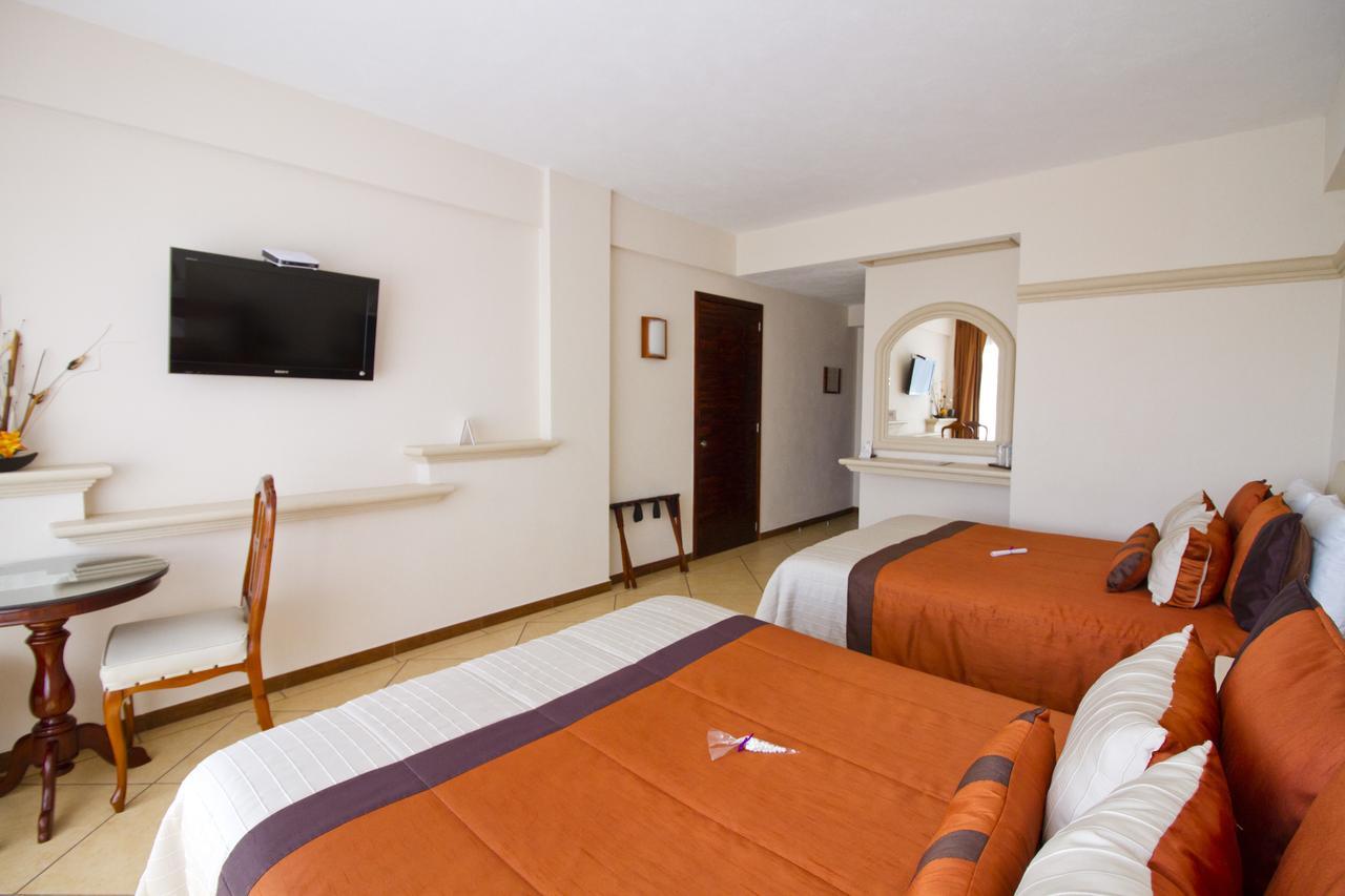 צ'יגנהופאן Hotel 9 Manantiales מראה חיצוני תמונה