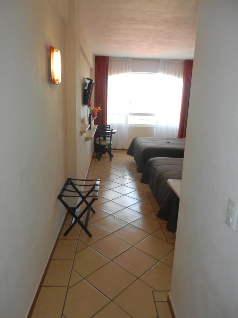 צ'יגנהופאן Hotel 9 Manantiales מראה חיצוני תמונה