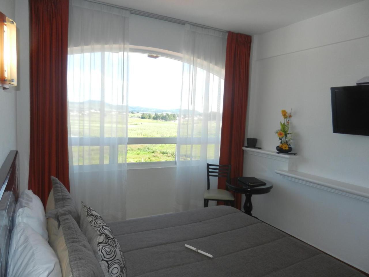 צ'יגנהופאן Hotel 9 Manantiales מראה חיצוני תמונה