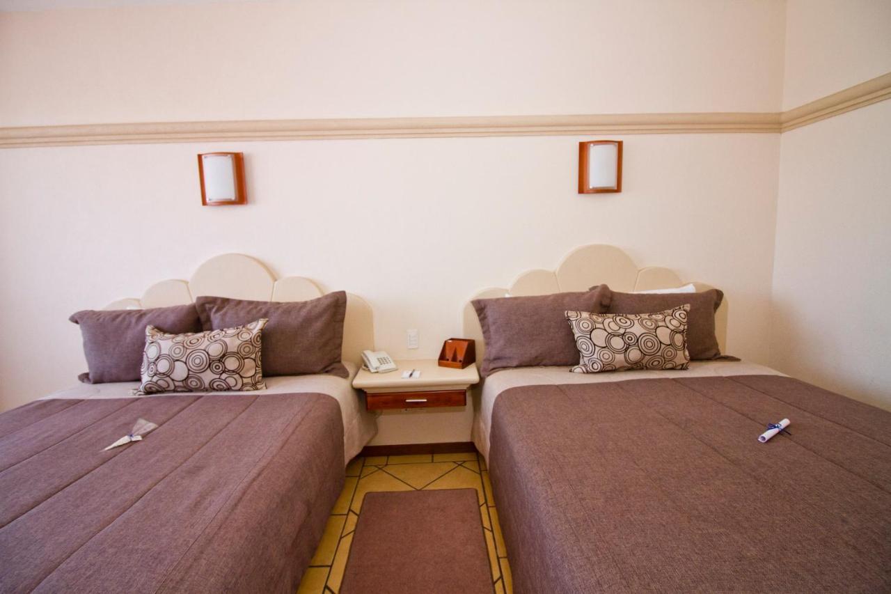 צ'יגנהופאן Hotel 9 Manantiales מראה חיצוני תמונה