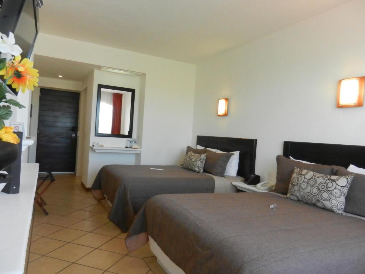 צ'יגנהופאן Hotel 9 Manantiales מראה חיצוני תמונה