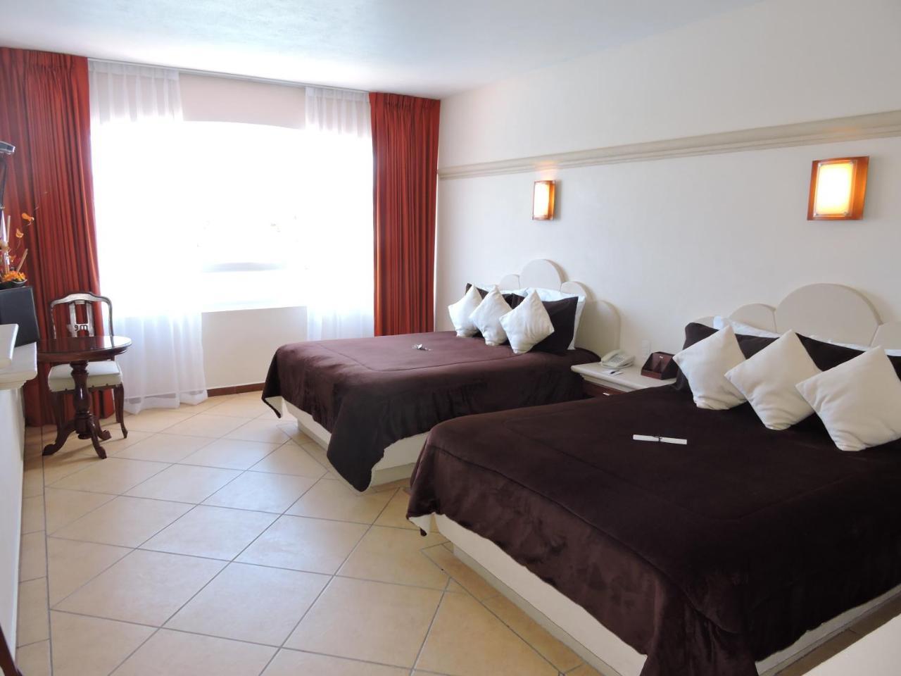 צ'יגנהופאן Hotel 9 Manantiales מראה חיצוני תמונה