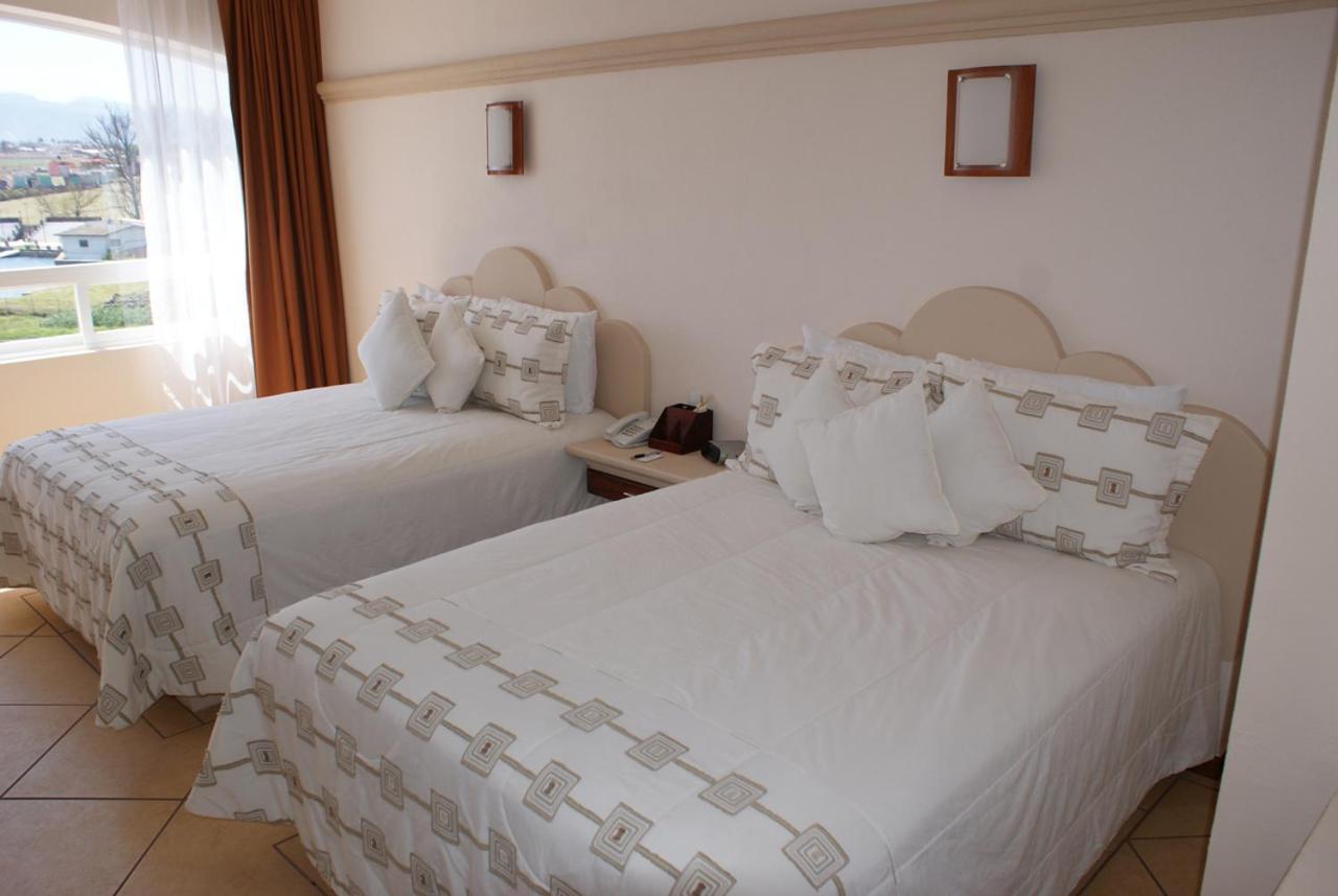 צ'יגנהופאן Hotel 9 Manantiales מראה חיצוני תמונה