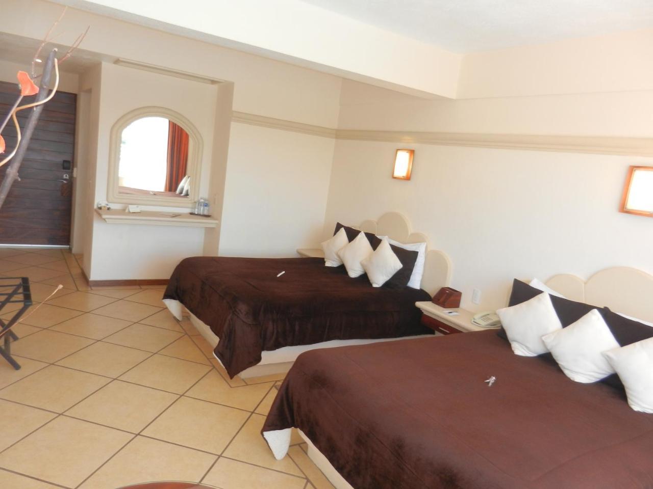 צ'יגנהופאן Hotel 9 Manantiales מראה חיצוני תמונה
