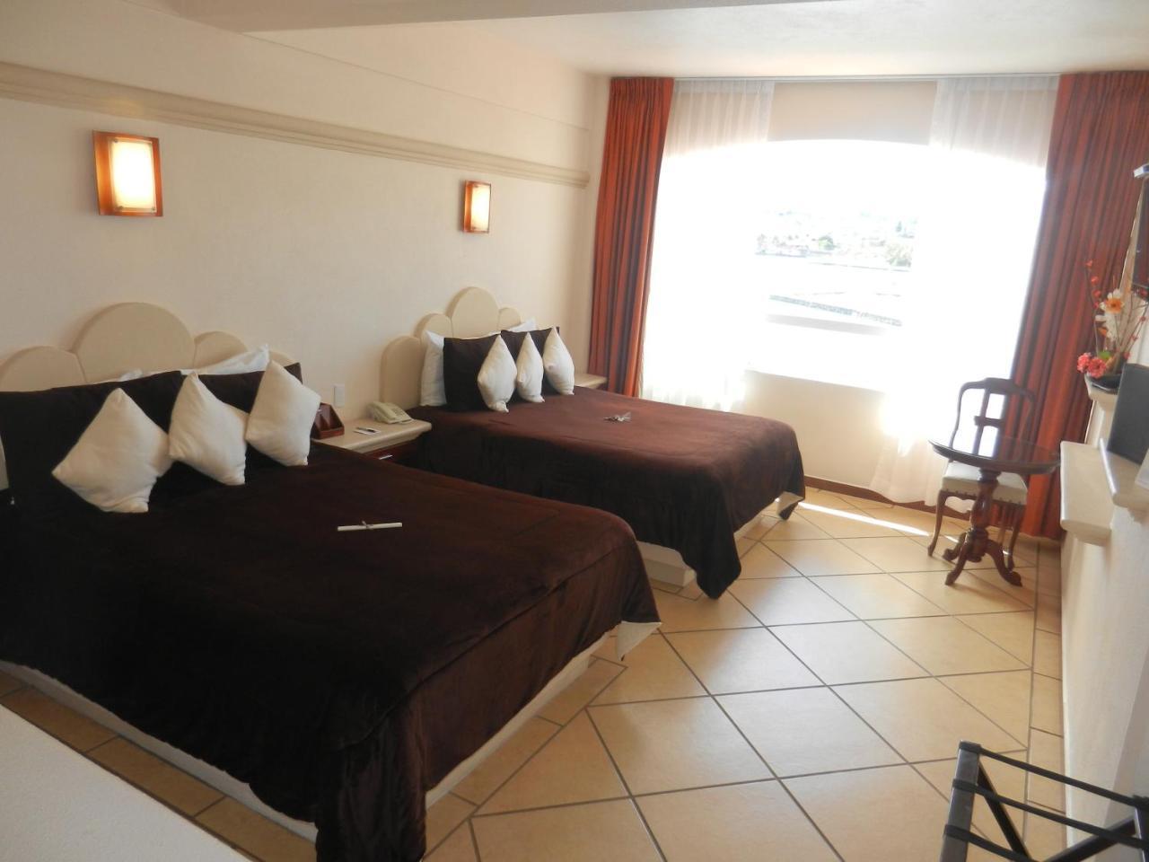 צ'יגנהופאן Hotel 9 Manantiales מראה חיצוני תמונה