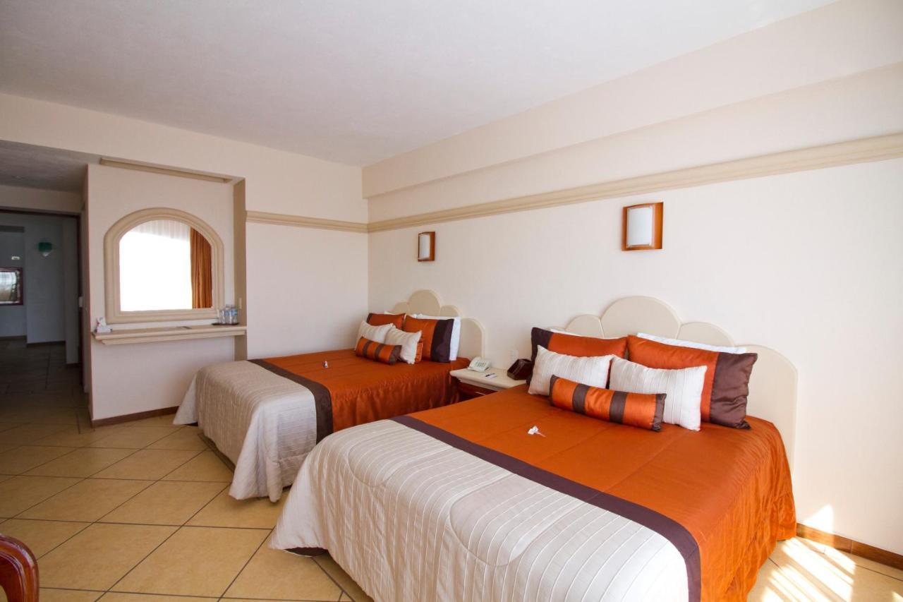 צ'יגנהופאן Hotel 9 Manantiales מראה חיצוני תמונה