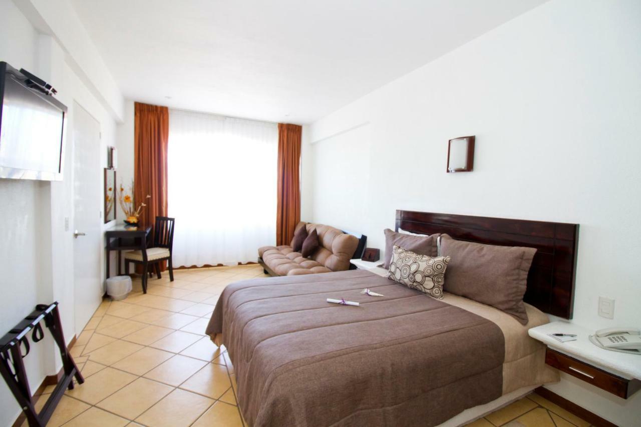 צ'יגנהופאן Hotel 9 Manantiales מראה חיצוני תמונה